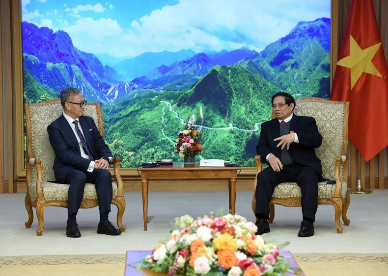 Премьер-министр Вьетнама Фам Минь Тьинь и Министр иностранных дел Лаоса Тхонгсаван Фомвихан. Фото: Чан Хай