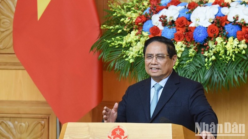 Премьер-министр Фам Минь Тьинь выступает с речью. Фото: Чан Хай Премьер-министр Фам Минь Тьинь выступает с речью. Фото: Чан Хай