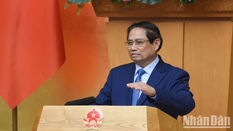 Премьер-министр Фам Минь Тьинь выступает с речью. Фото: Чан Хай Премьер-министр Фам Минь Тьинь выступает с речью. Фото: Чан Хай