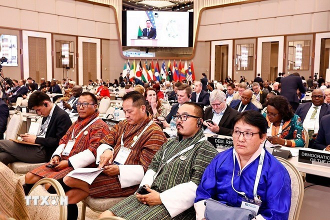 Делегаты слушают выступление Председателя НС Чан Тхань Мана. Фото: ВИА