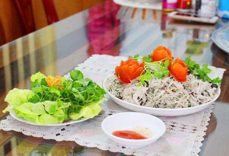 Жареная рисовая лапша с моллюсками. Фото: vnexpress.net Жареная рисовая лапша с моллюсками. Фото: vnexpress.net