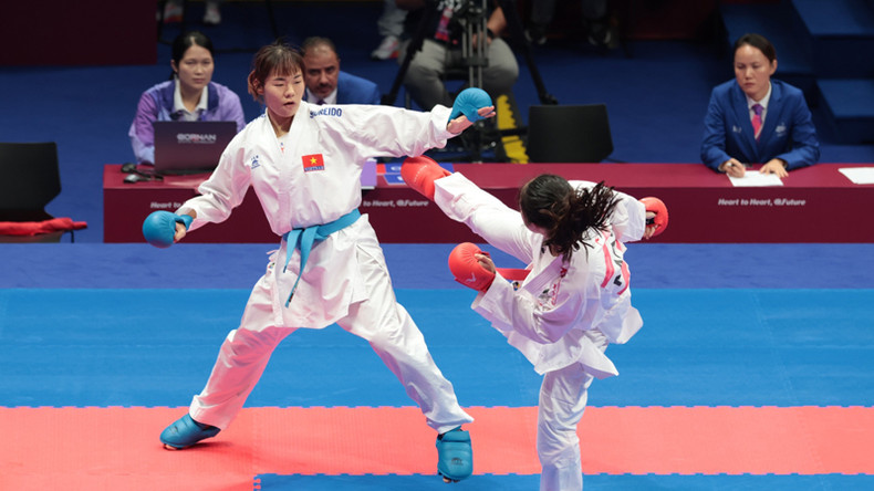 Нгуен Тхи Нгоан (в синих перчатках) не смогла одолеть соперницу из Китая. Нгуен Тхи Нгоан (в синих перчатках) не смогла одолеть соперницу из Китая.