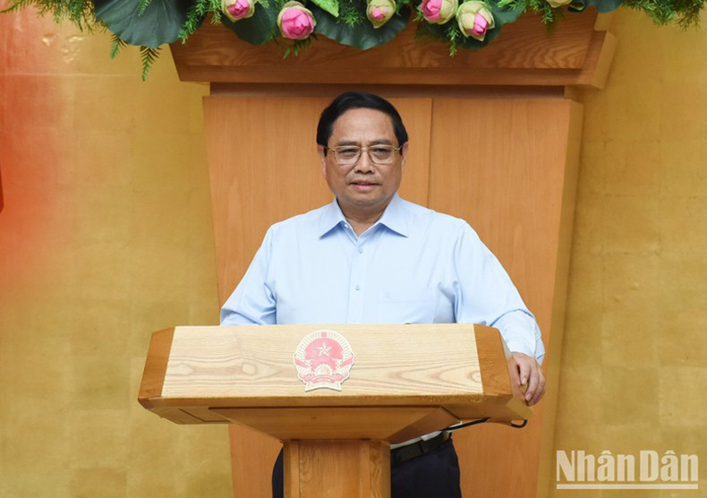 Премьер-министр Фам Минь Тьинь выступает с речью. Фото: Чан Хай Премьер-министр Фам Минь Тьинь выступает с речью. Фото: Чан Хай