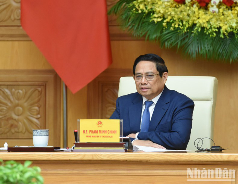 Премьер-министр Фам Минь Тьинь выступает с речью. Фото: Чан Хай