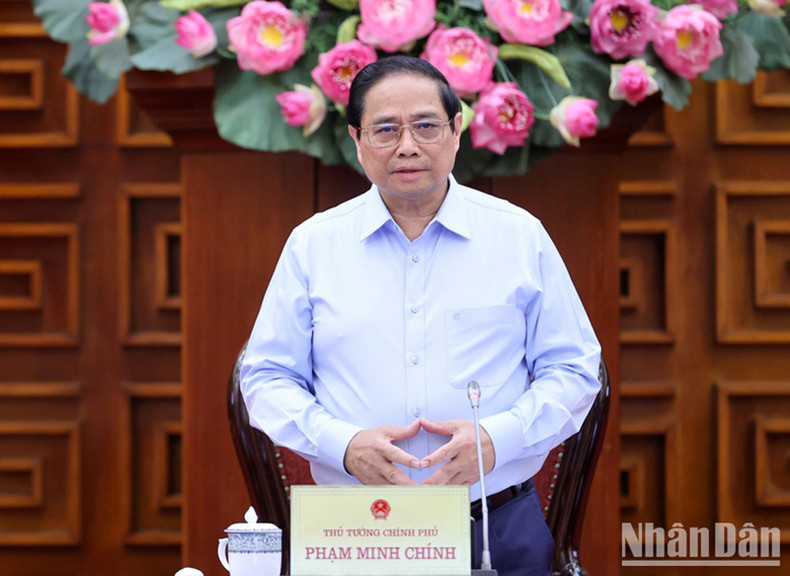 Премьер-министр Фам Минь Тьинь выступает с речью. Фото: Чан Хай Премьер-министр Фам Минь Тьинь выступает с речью. Фото: Чан Хай