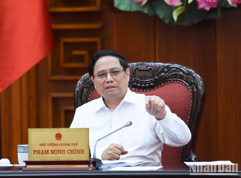 Премьер-министр Фам Минь Тьинь выступает с речью. Фото: Чан Хай Премьер-министр Фам Минь Тьинь выступает с речью. Фото: Чан Хай