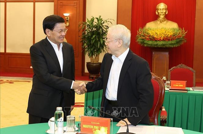 Генеральный секретарь ЦК КПВ Нгуен Фу Чонг и Генеральный секретарь ЦК НРПЛ, Президент Лаоса Тхонглун Сисулит. Фото: ВИА