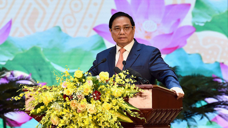 Премьер-министр Фам Минь Тьинь выступает на церемонии. Фото: Чан Хай Премьер-министр Фам Минь Тьинь выступает на церемонии. Фото: Чан Хай