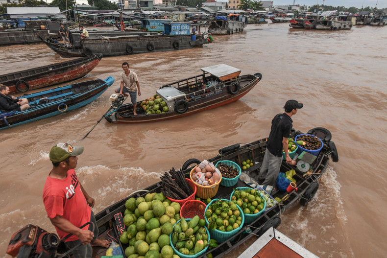 Плавучий рынок дельты реки Меконг. Плавучий рынок дельты реки Меконг.