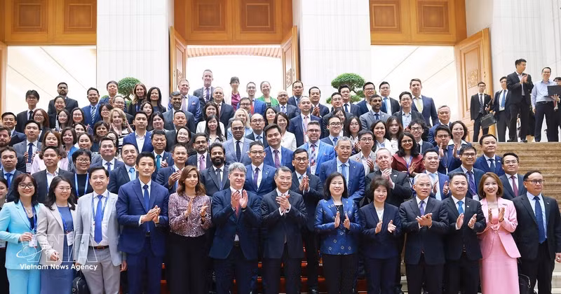 Премьер-министр Ле Минь Хынг встречается с делегацией высокопоставленных предприятий Делового совета США – АСЕАН (USABC). Фото: ВИА