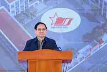 Премьер-министр Фам Минь Тьинь выступает на церемонии. Фото: Чан Хай