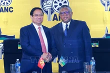 Премьер-министр Фам Минь Тьинь встречается с Генеральным секретарём партии АНК. Фото: ВИА