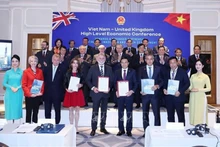 Генеральный секретарь ЦК КПВ То Лам присутствует на церемонии подписания соглашений о сотрудничестве между министерствами, ведомствами, местными органами и предприятиями двух стран. Фото: ВИА