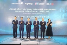 Церемония запуска системы розничных QR-платежей между Вьетнамом и Китаем. Фото предоставлено NAPAS