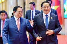 Премьер-министр Вьетнама Фам Минь Тьинь и Премьер-министр Лаоса Сонексай Сипхандон. Фото: VGP