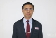 И. о главного редактора лаосской газеты «Pasaxon» Сивань Хомсайядед. Фото: Чинь Зунг