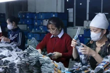 Текстильная и обувная продукция всё ещё обладает большим потенциалом на внутреннем рынке Вьетнама. Фото: ВИА