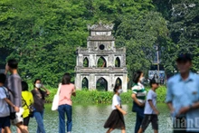 Туристическая отрасль поставила цель принять 25 млн международных туристов и 150 млн внутренних туристов в 2026 году. Фото: Тхань Дат 