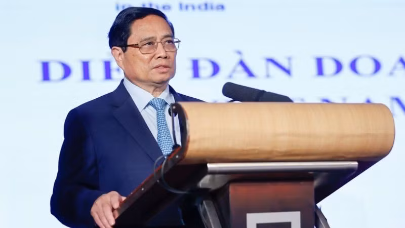 Премьер-министр Фам Минь Тьинь выступает на форуме. Фото: Нят Бак