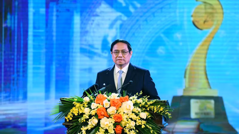 Премьер-министр Фам Минь Тьинь выступает на церемонии. Фото: Чан Хай