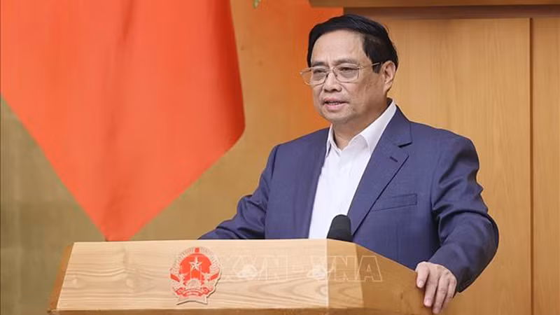 Премьер-министр Фам Минь Тьинь выступает на заседании. Фото: ВИА