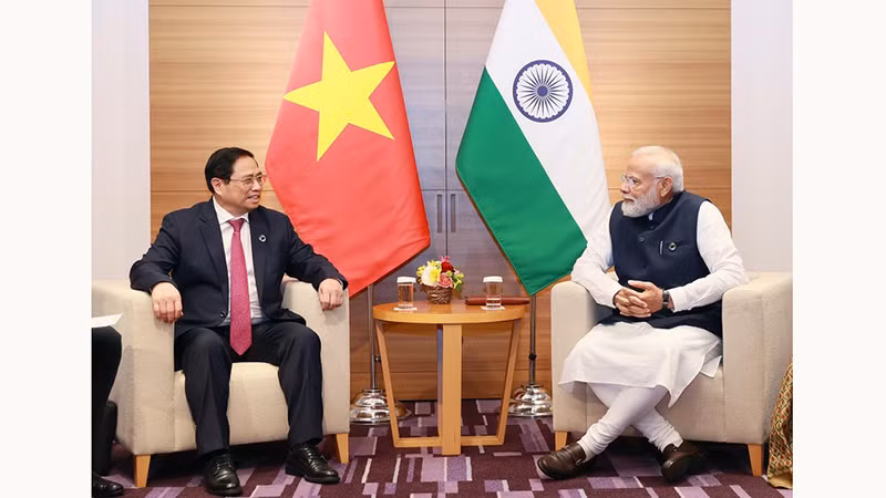 Премьер-министр Фам Минь Тьинь и Премьер-министр Индии Нарендра Моди. Фото: Зыонг Жанг