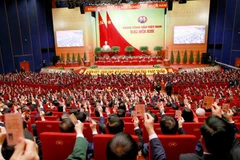 Делегаты голосуют за утверждение Резолюции XIII съезда. Фото: ВИА