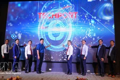 Делегаты принимают участие в церемонии запуска новой версии Технологической биржи города Хошимина. Фото: ВИА