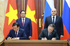 [Фото] Церемония подписания соглашения о сотрудничестве в строительстве атомной электростанции между Вьетнамом и Россией