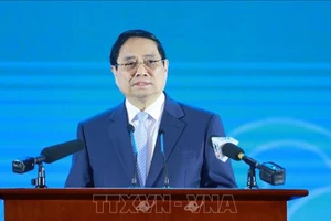 Премьер-министр Вьетнама Фам Минь Тьинь выступает на форуме. Фото: ВИА