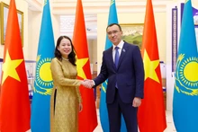 Вице-президент Во Тхи Ань Суан и Председатель Сената Парламента Казахстана Маулен Ашимбаев. Фото: МИД Вьетнама