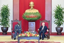 Генеральный секретарь ЦК КПВ Нгуен Фу Чонг и Президент Уганды Йовери Кагута Мусевени. Фото: Данг Кхоа