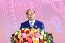 Президент Нгуен Суан Фук выступает на церемонии. Фото: Тхань Дат