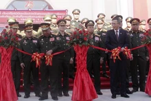 Делегаты разрезают ленту в знак открытия проекта. Фото: ВИА