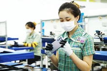 Производство смартфонов на заводе «Samsung» в провинции Тхайнгуен. Фото: Газета «Тхайнгуен»