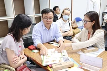Вьетнамские и японские предприятия обмениваются информацией. Фото: hcmcpv.org.vn