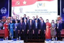 Постоянный вице-премьер Фам Бинь Минь и делегаты на конференции. Фото: ВИА