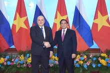 Премьер-министр Фам Минь Тьинь и Председатель Правительства России Михаил Владимирович Мишустин. Фото: Чан Хай