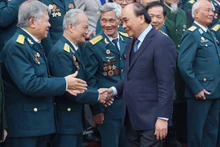 Президент Нгуен Суан Фук и участники встречи. Фото: vpctn.gov.vn