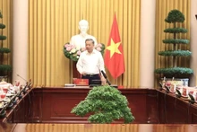 Президент То Лам выступает на встрече. Фото: Ван Ань