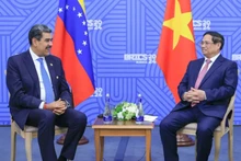 Премьер-министр Вьетнама Фам Минь Тьинь (справа) и Президент Венесуэлы Николас Мадуро. Фото: VGP