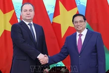 Премьер-министр Вьетнама Фам Минь Тьинь и Премьер-министр Беларуси Роман Головченко. Фото: ВИА