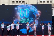 Делегаты запускают кампанию «Час Земли-2023». Фото: Лам Жанг