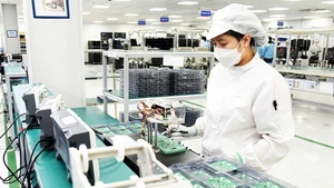 Производство электронных компонентов в компании Bumjin Electronics Vina. Фото: Хай Чан