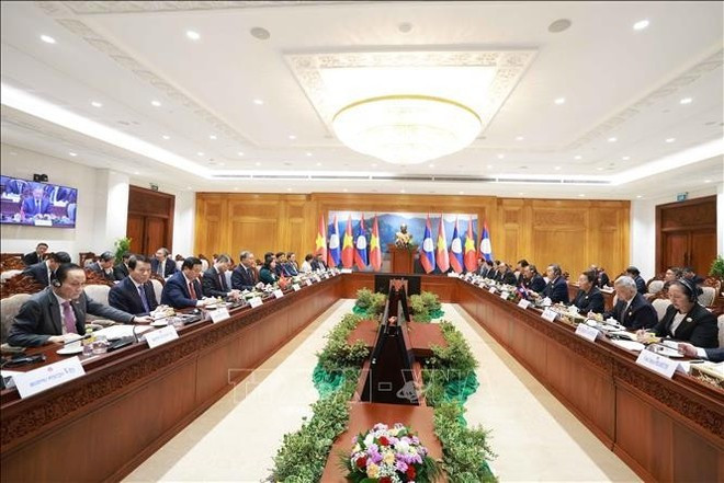 Генеральный секретарь То Лам проводит встречу с Председателем Национального собрания Лаоса Сайсомпоном Фомвиханом. (Фото: ВИА)