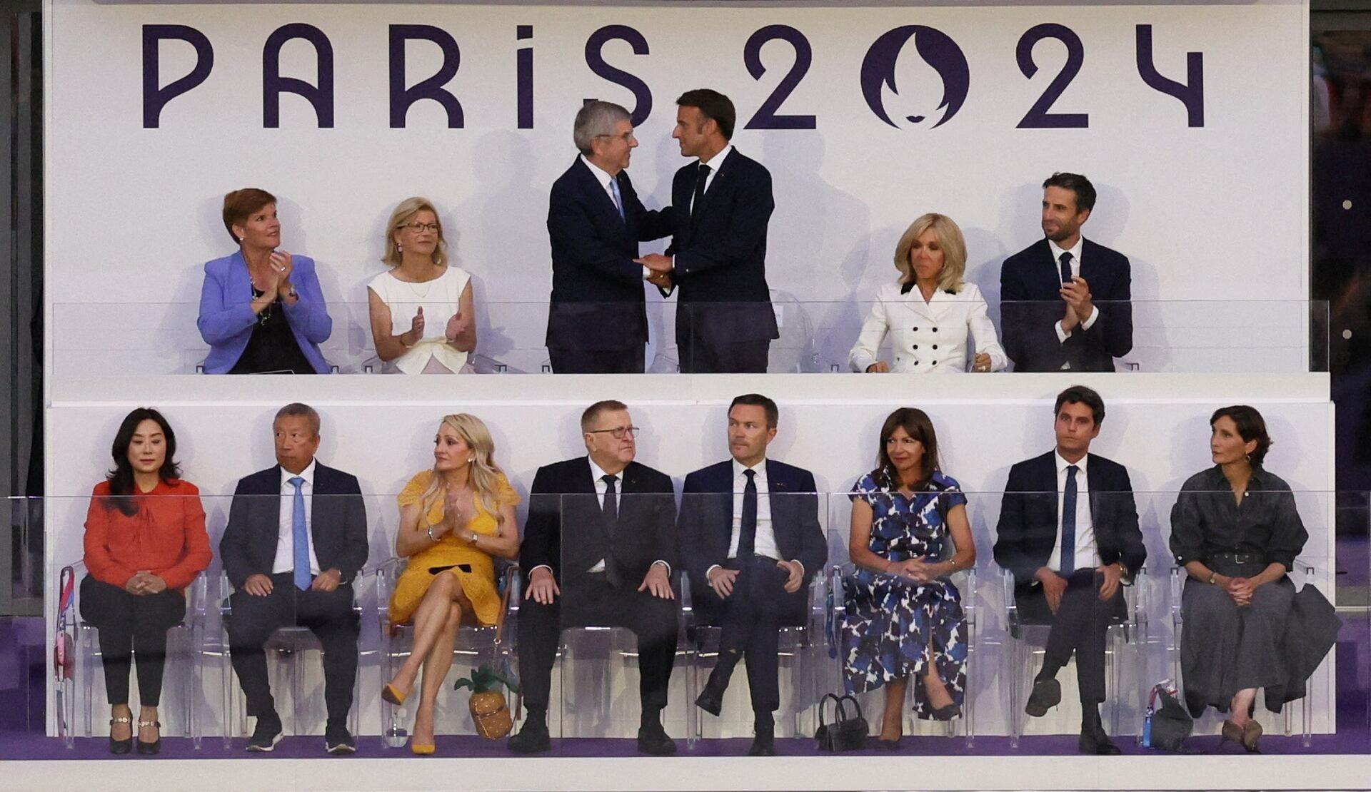 Президент Франции Эммануэль Макрон с супругой, многие руководители стран и спортивных организаций на церемонии закрытия.