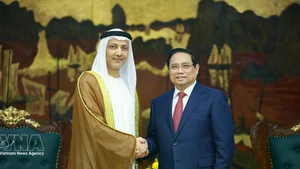 Премьер-министр Фам Минь Тьинь принял Бадер Альматруши, Посла ОАЭ во Вьетнаме. Фото: ВИА