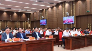 Делегаты на конференции по изучению и внедрению Резолюции № 02-NQ/TW. 