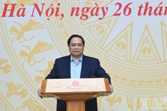 Премьер-министр Фам Минь Тьинь выступает на заседании. Фото: Чан Хай