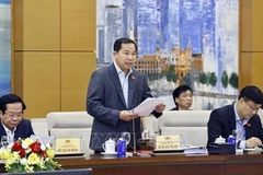 Генсекретарь НС Ле Куанг Мань, одновременно Руководитель Канцелярии НС и Руководитель Канцелярии Национального избирательного совета, выступает на конференции 26 февраля Фото: ВИА